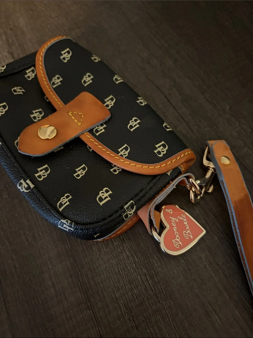 Dooney & Bourke Black Monogram Wristlet with Tan Trim